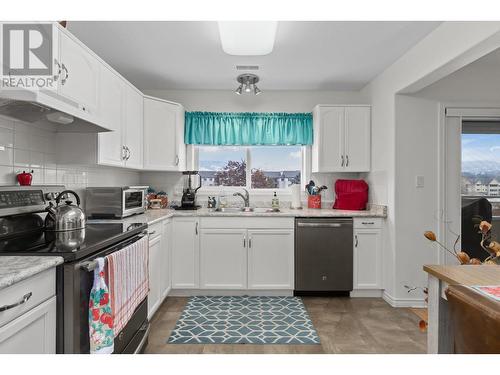 1895 Ambrosi Road Unit# 406, Kelowna, BC - Indoor Photo Showing Kitchen With Double Sink