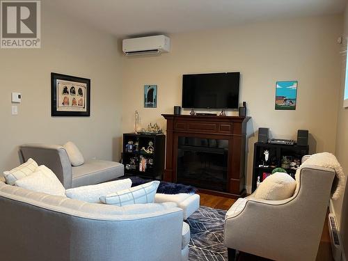 7 Jera Street, St.Philips, NL - Indoor Photo Showing Living Room With Fireplace