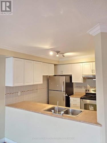 3948 Manatee Way, Mississauga (Churchill Meadows), ON - Indoor Photo Showing Kitchen With Stainless Steel Kitchen With Double Sink