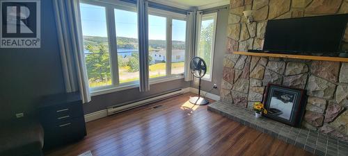 634-636 Ville Marie Drive, Marystown, NL - Indoor Photo Showing Other Room With Fireplace