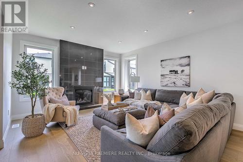 2322 Wickerson Road, London, ON - Indoor Photo Showing Living Room With Fireplace