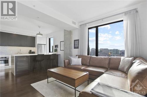 Living Room view to Kitchen - 20 Daly Avenue Unit#1806, Ottawa, ON - Indoor Photo Showing Living Room