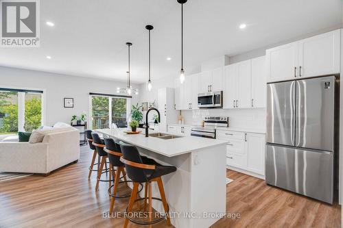 14 - 500 Sunnystone Road, London, ON - Indoor Photo Showing Kitchen With Stainless Steel Kitchen With Double Sink With Upgraded Kitchen