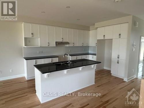 1545 Quarry Street, Prescott And Russell, ON - Indoor Photo Showing Kitchen With Double Sink