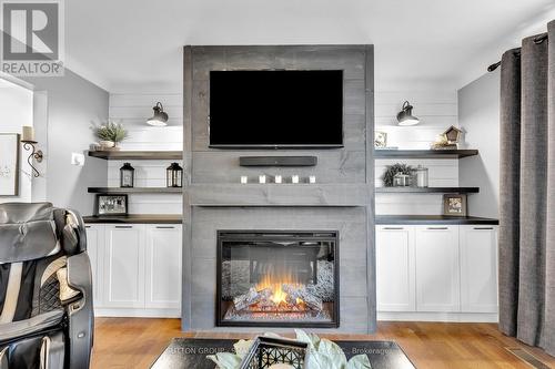 213 Pryde Boulevard, South Huron (Exeter), ON - Indoor Photo Showing Living Room With Fireplace