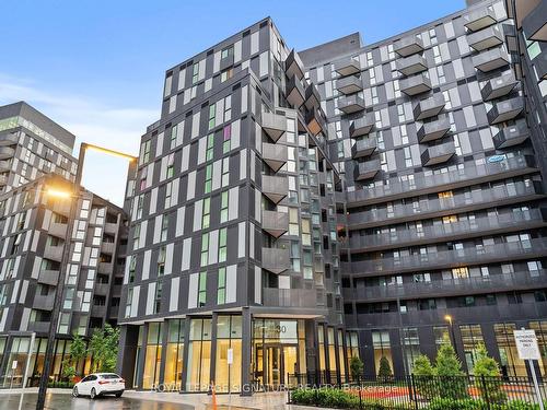 203-30 Tretti Way, Toronto, ON - Outdoor With Balcony With Facade