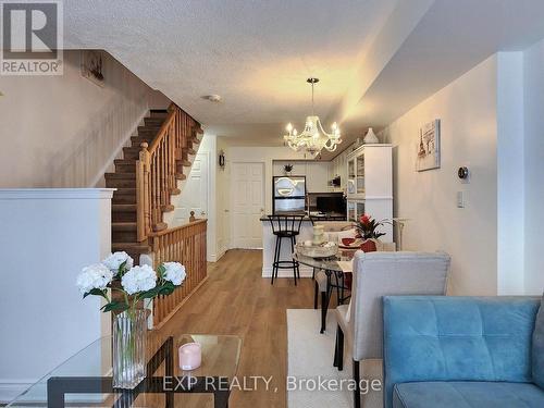 102 - 65 Turntable Crescent, Toronto (Dovercourt-Wallace Emerson-Junction), ON - Indoor Photo Showing Living Room