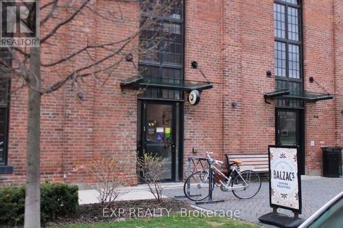 102 - 65 Turntable Crescent, Toronto (Dovercourt-Wallace Emerson-Junction), ON - Outdoor With Exterior