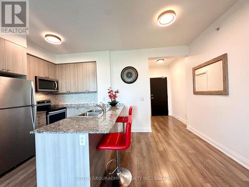 311 - 65 Yorkland Boulevard, Brampton (Goreway Drive Corridor), ON - Indoor Photo Showing Kitchen With Double Sink With Upgraded Kitchen