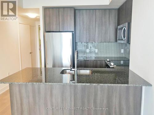 1509 - 20 Shore Breeze Drive, Toronto (Mimico), ON - Indoor Photo Showing Kitchen With Double Sink With Upgraded Kitchen