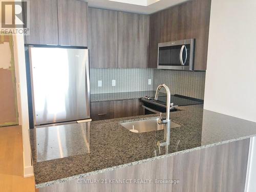 1509 - 20 Shore Breeze Drive, Toronto (Mimico), ON - Indoor Photo Showing Kitchen With Upgraded Kitchen