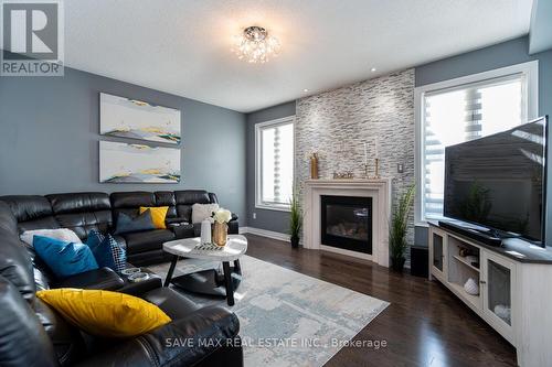 12 Lisson Crescent, Brampton (Credit Valley), ON - Indoor Photo Showing Living Room With Fireplace