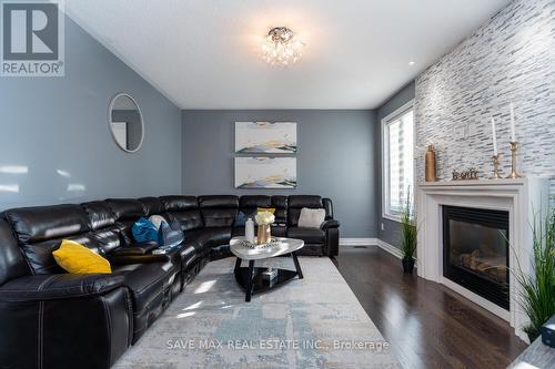 12 Lisson Crescent, Brampton (Credit Valley), ON - Indoor Photo Showing Living Room With Fireplace