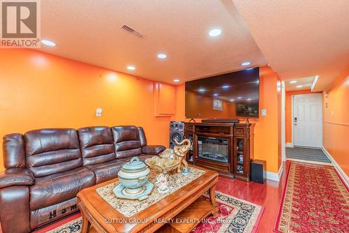 7074 Magic Court, Mississauga (Malton), ON - Indoor Photo Showing Living Room With Fireplace