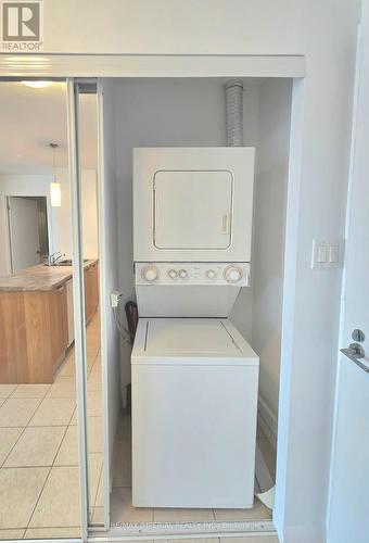 3001 - 38 Grenville Street, Toronto (University), ON - Indoor Photo Showing Laundry Room