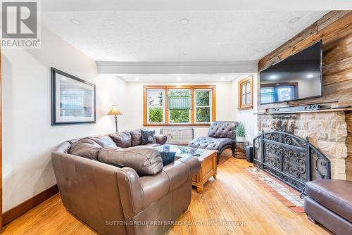 1248 Southdale Road E, London, ON - Indoor Photo Showing Living Room With Fireplace