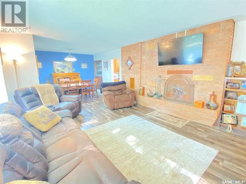 301 Aspen Street, Maple Creek, SK - Indoor Photo Showing Living Room With Fireplace