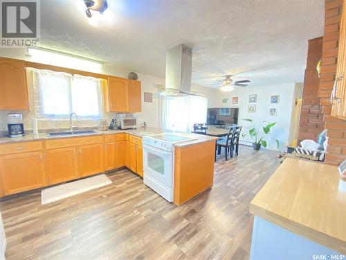 301 Aspen Street, Maple Creek, SK - Indoor Photo Showing Kitchen With Double Sink