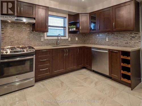 13 Mcknight Crescent, New Tecumseth (Tottenham), ON - Indoor Photo Showing Kitchen With Double Sink