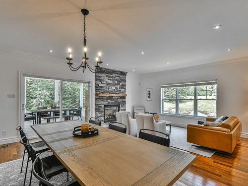 Salle Ã  manger - 78 Rue Du Sommet, Morin-Heights, QC - Indoor Photo Showing Dining Room With Fireplace