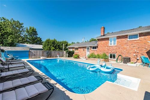 24 Harbinger Drive, Stoney Creek, ON - Outdoor With In Ground Pool With Backyard