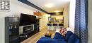 228 - 7 Bellcastle Gate, Whitchurch-Stouffville, ON  - Indoor With Fireplace 