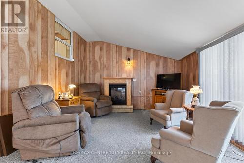 36 Briscoe Street E, London, ON - Indoor Photo Showing Living Room With Fireplace