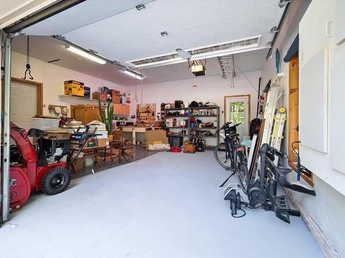 Garage - 226 Rue Des Patriotes, Bromont, QC - Indoor Photo Showing Garage