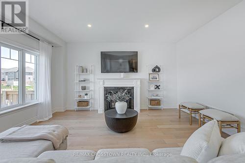 23 Lorne Thomas Place, New Tecumseth, ON - Indoor Photo Showing Living Room With Fireplace