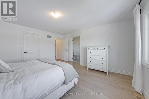 23 Lorne Thomas Place, New Tecumseth, ON - Indoor Photo Showing Bedroom