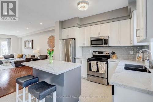 23 - 4165 Upper Middle Road, Burlington (Rose), ON - Indoor Photo Showing Kitchen With Stainless Steel Kitchen With Double Sink With Upgraded Kitchen