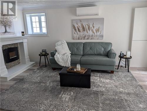 412 Saint-Raphael Nord, Saint-Marie-Saint-Raphaël, NB - Indoor Photo Showing Living Room With Fireplace