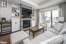 1869 Highway 118 W Unit# Bhv-B-105, Bracebridge, ON  - Indoor Photo Showing Living Room With Fireplace 