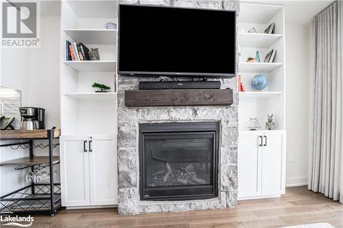 1869 Highway 118 W Unit# Bhv-B-105, Bracebridge, ON - Indoor Photo Showing Living Room With Fireplace