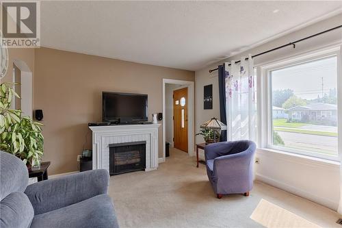 74 Barnet Boulevard, Renfrew, ON - Indoor Photo Showing Living Room With Fireplace