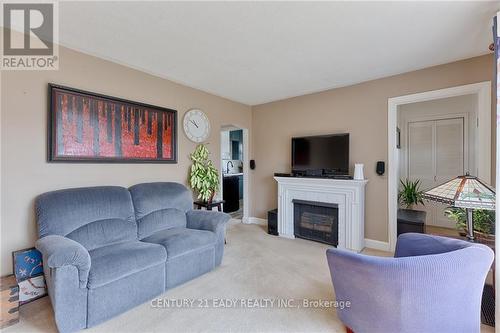 74 Barnet Boulevard, Renfrew, ON - Indoor Photo Showing Living Room With Fireplace