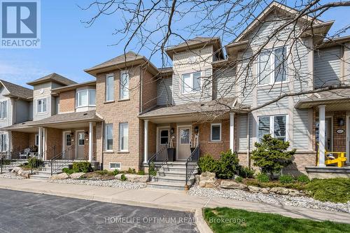 58 - 515 North Service Road, Hamilton (Lakeshore), ON - Outdoor With Deck Patio Veranda With Facade