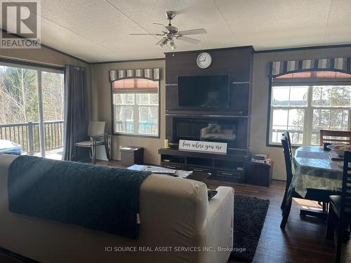 Pplr701 - 1047 Bonnie Lake Camp Road, Bracebridge, ON - Indoor Photo Showing Living Room With Fireplace