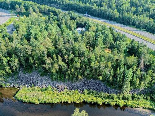 Photo aÃ©rienne - 900 Ch. Giroux, Piedmont, QC - Outdoor With Body Of Water With View