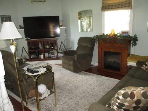 6 King Street, Dryden, ON - Indoor Photo Showing Living Room With Fireplace