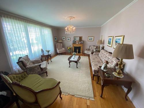 Living room - 44 Rue Du Jardin, La Malbaie, QC - Indoor Photo Showing Living Room With Fireplace