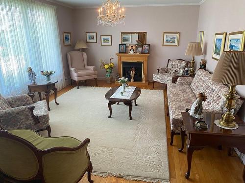 Living room - 44 Rue Du Jardin, La Malbaie, QC - Indoor Photo Showing Living Room With Fireplace