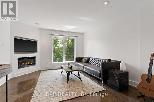 3 - 55 Birchbank Lane, Toronto (Banbury-Don Mills), ON - Indoor Photo Showing Living Room With Fireplace