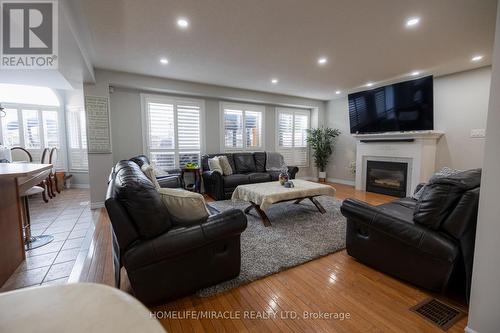 574 Clearsky Avenue, Oshawa (Taunton), ON - Indoor Photo Showing Living Room With Fireplace