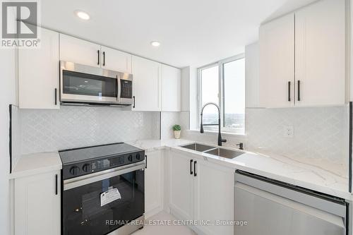 1404 - 1360 Rathburn Road E, Mississauga, ON - Indoor Photo Showing Kitchen With Double Sink With Upgraded Kitchen