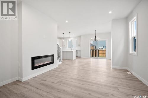 151 Keith Way, Saskatoon, SK - Indoor Photo Showing Living Room With Fireplace