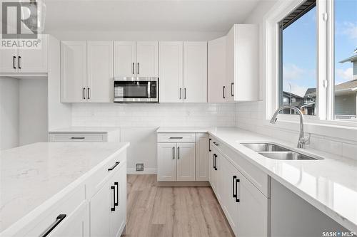 151 Keith Way, Saskatoon, SK - Indoor Photo Showing Kitchen With Double Sink