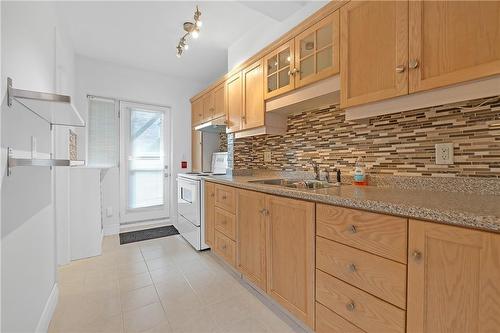 97 Connaught Avenue S|Unit #9, Hamilton, ON - Indoor Photo Showing Kitchen With Double Sink