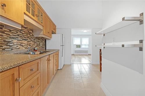 97 Connaught Avenue S|Unit #9, Hamilton, ON - Indoor Photo Showing Kitchen With Double Sink