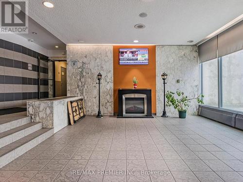 903 - 5 San Romano Way, Toronto, ON - Indoor With Fireplace